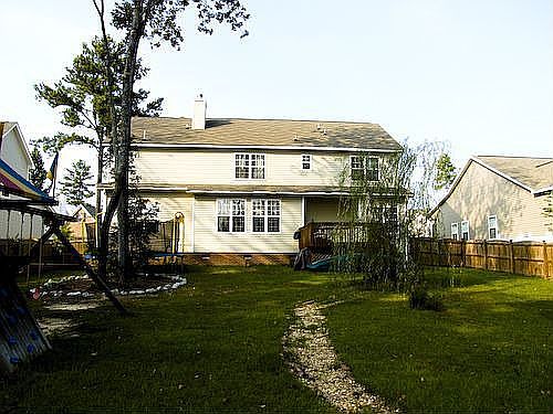 View of backyard w/path