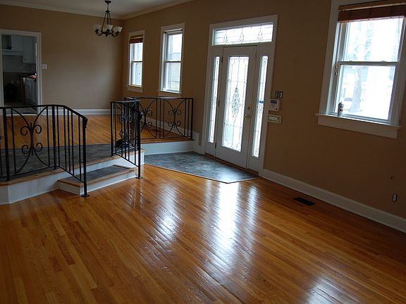 Living room
						:
						Spacious sunken living room with architectural detail & molding.