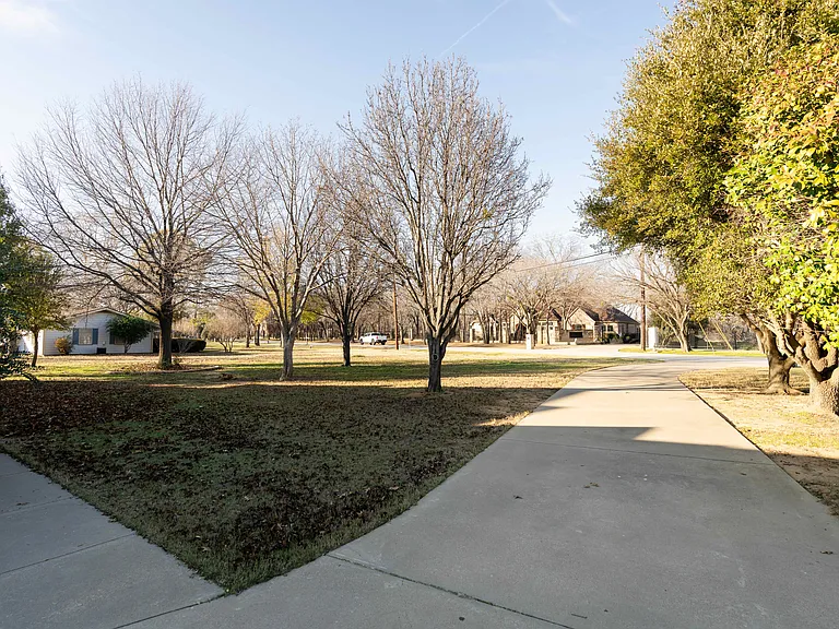 Beautiful driveway leading into this acre property