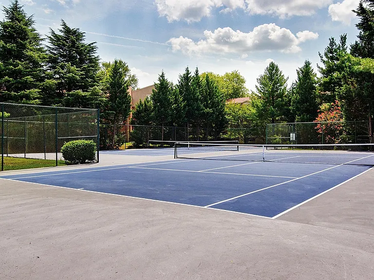 One of six tennis courts on-site
