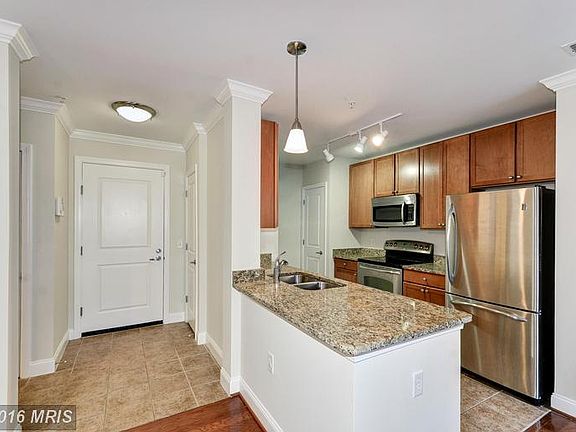 Entry with Coat Closet and the Kitchen