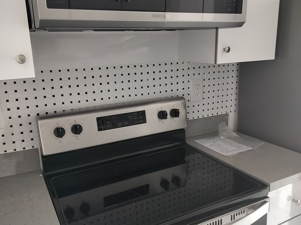 Kitchen - New Appliances, includes dishwasher and microwave.
