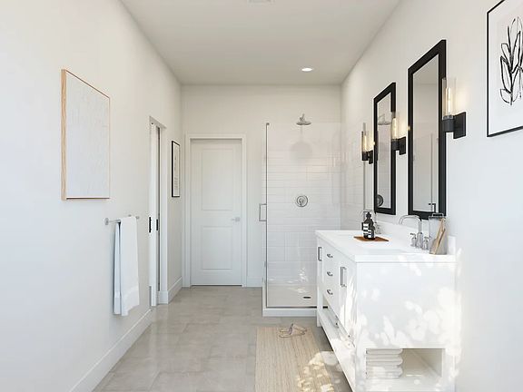 Primary bath with glass shower enclosure