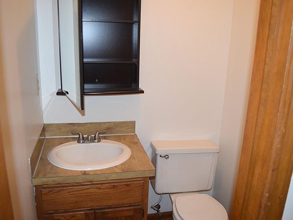this is the half bath on the main floor. It has a cabinet over the sink for make up, tooth brushes, etc.