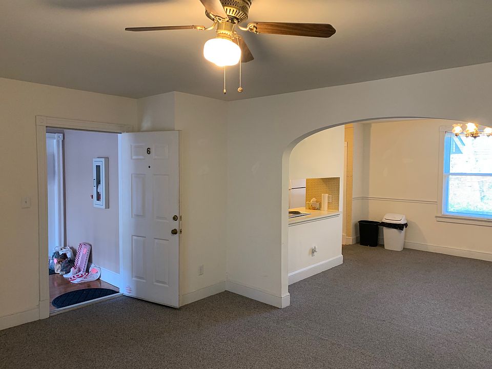 Front door w/ view of den, dining and kitchen