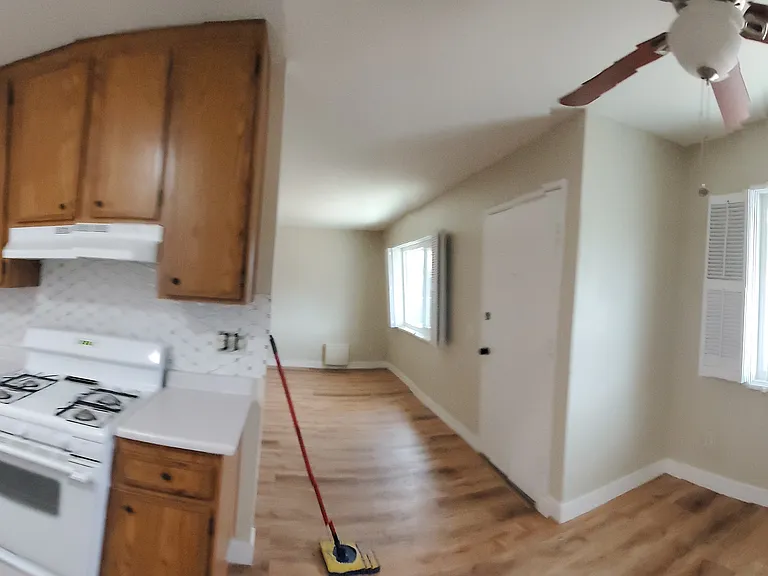 Pan of kitchen , dining and leading into the living room
