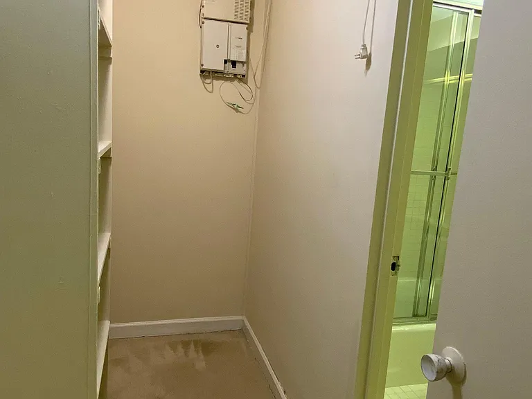 Closet on the left, bathroom door on the right.