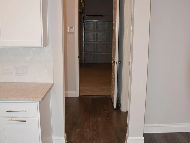 GARAGE IS CLOSE TO KITCHEN FOR MAX CONVENIENCE