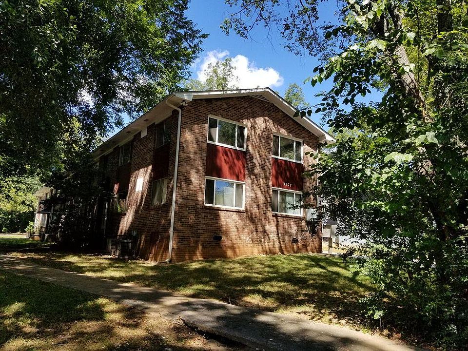 Front of 8-unit apartment building - large courtyard, plenty of street parking and two entrances for all units.