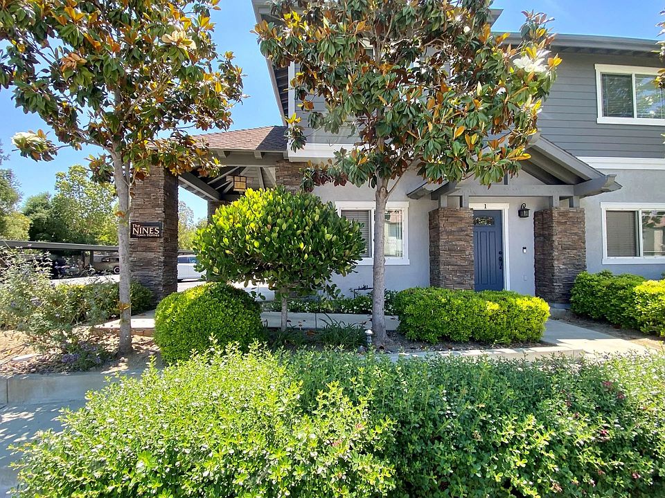 Beautifully landscaped enterance to The Nines Townhomes in Escondido, California.
