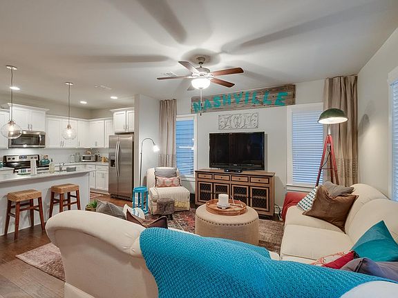 den is open to the kitchen