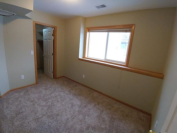 Second bedroom, with walk-in closet to private laundry.