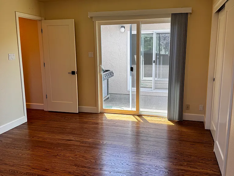 Big Bedroom (#3) with double closets and patio door