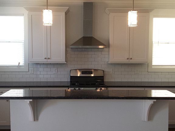 Kitchen with granite and stainless appliances