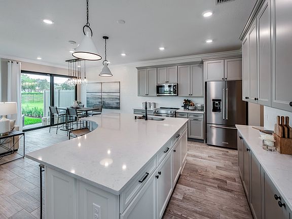 Kitchen with designer finishes and stainless steel appliances