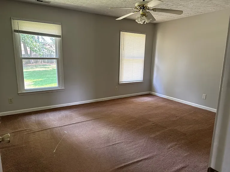 Large master bedroom with bathroom and walk in closet. New flooring to be installed 10 July.