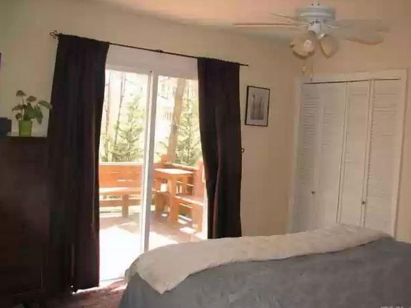 Master bedroom opening onto deck