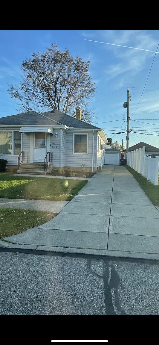 7119 Orchard Ave photo 1