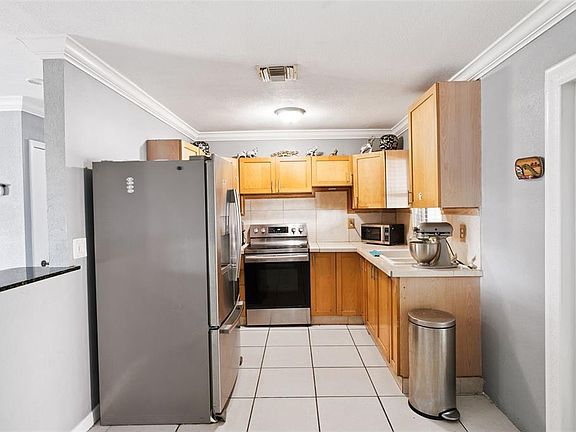 5th image of 6694 RIVO ALTO AVENUE