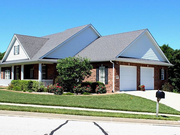 Front & Side-Entry Garage View of Home