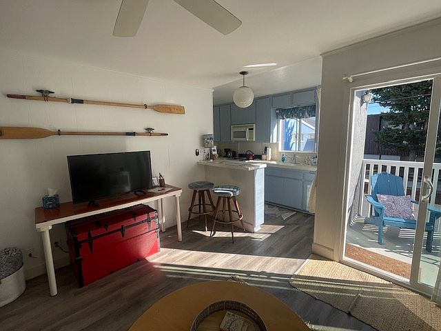 View from sofa to outdoor and kitchen