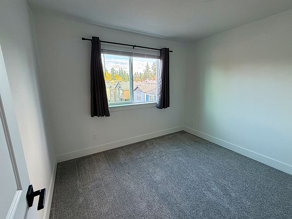 The bedroom available on the top floor of a newly built home near Nike, Costco, and 2 train stations.