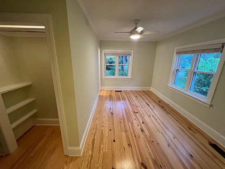 primary bedroom with full bath