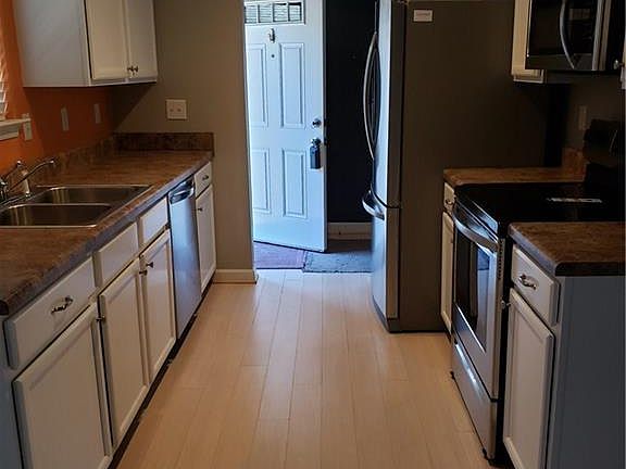 Kitchen looking toward foyer