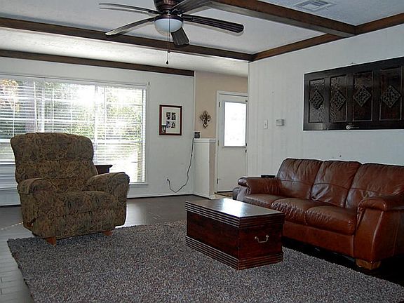 Richly finished updated laminate flooring.