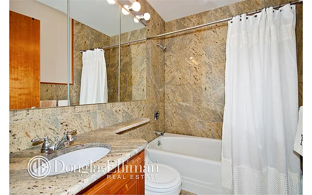 Sold by Douglas Elliman | media 11