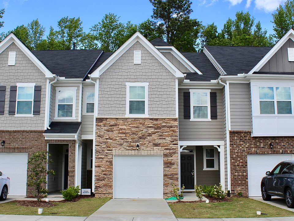 Front of Townhome - 1-Car Garage