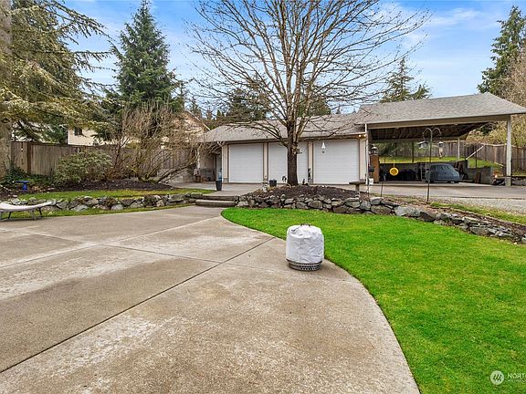 Additional storage for parking an RV or more in this 864 sq ft carport.>