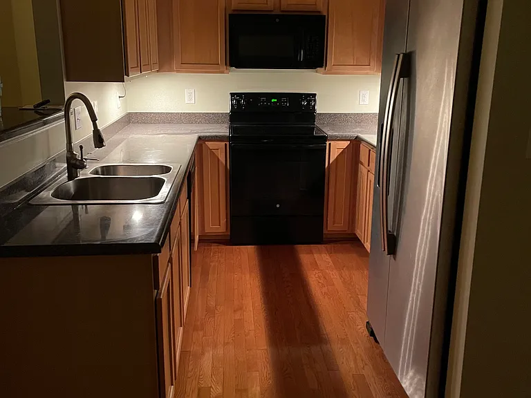 Kitchen with under cabinet lighting.