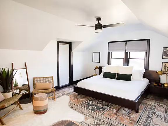 Primary Bedroom Suite: King Bed, Sitting Area, Desk + Full ensuite Bathroom