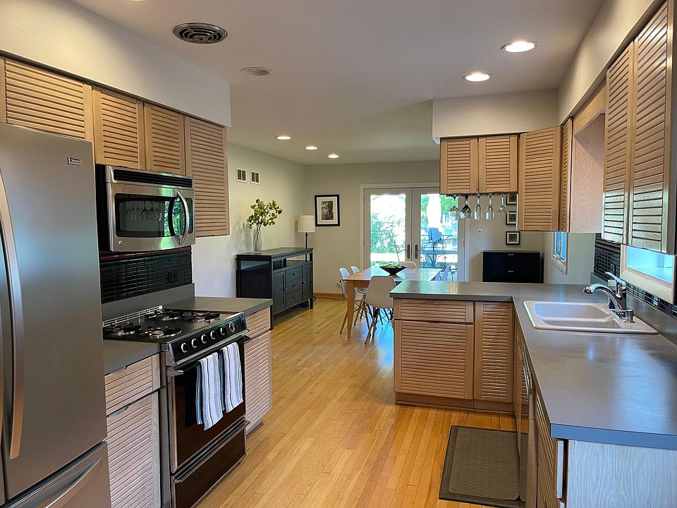 Kitchen w/stainless appliances.