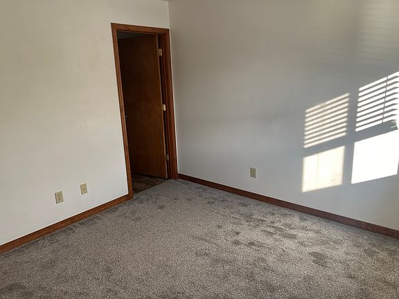 Primary bedroom with a half bath ensuite.