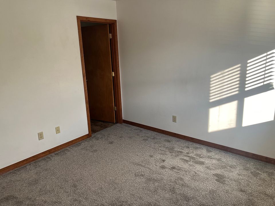Primary bedroom with a half bath ensuite.
