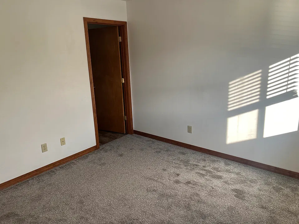 Primary bedroom with a half bath ensuite.
