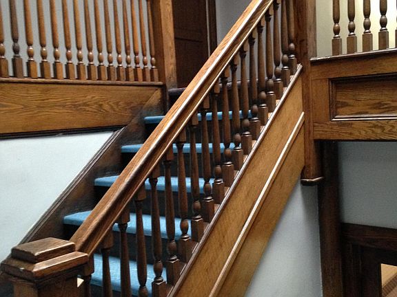 Front staircase with skylight.