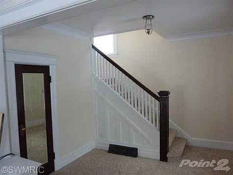 Beautiful open stairway to upper level.