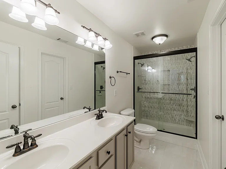walk in closet in primary bathroom