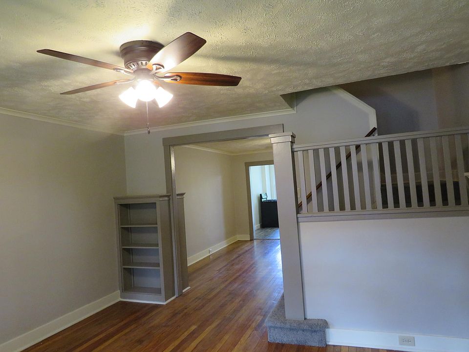 Built ins add the perfect storage, and new ceiling fans in the LR and DR