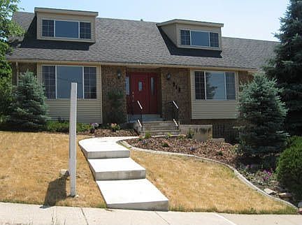 Nice Front Yard with New Entry Doors and Hardware