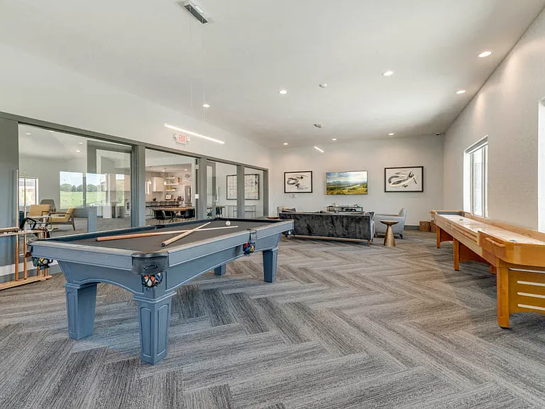 Start up a friendly game of shuffleboard or pool in the large game room.