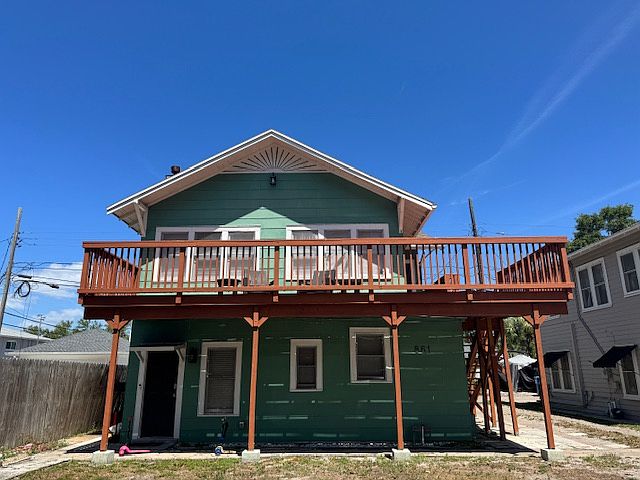 From the outside, this is the upstairs Unit. A similar Gatehouse is next door with a single family home on the other side.