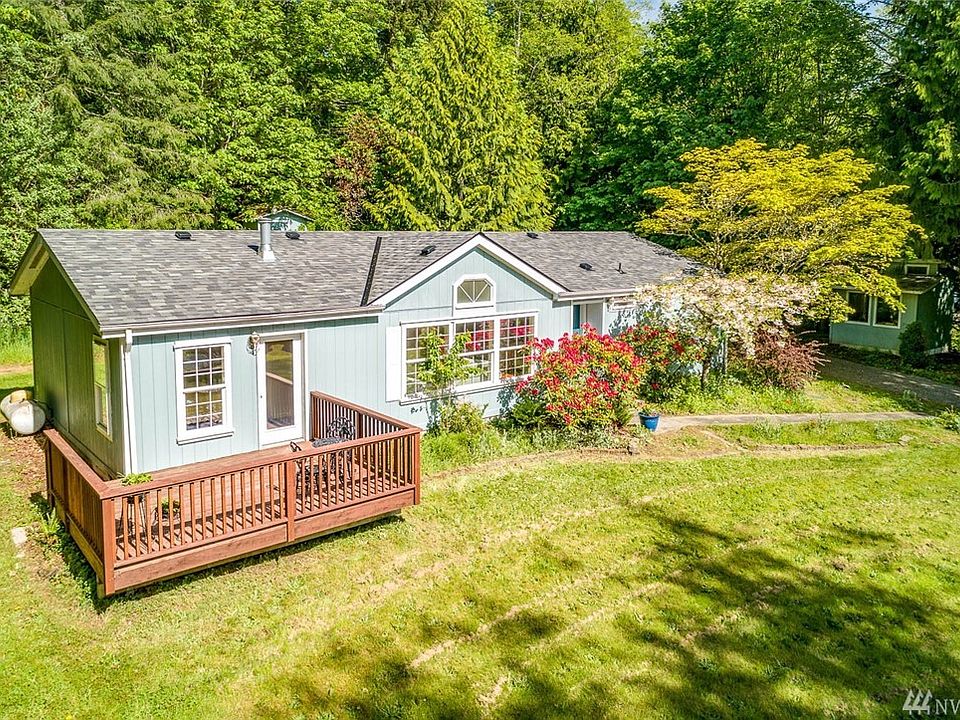 3320 Oak Bay Road is located ~3 miles south of Port Hadlock and ~6 miles north of Port Ludlow. The home is sited at the crest of the 2.48 acre lot.