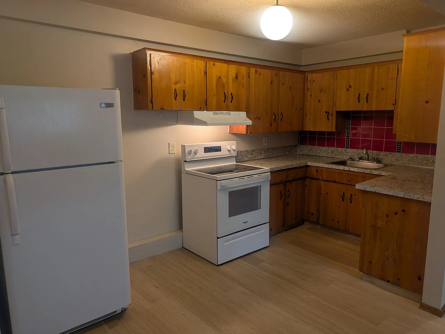 New Flooring + New Stove! | Cozy 2 Bed/1 Bath Lower Unit Across From Golf Course In A Quiet Build... — Photo 3