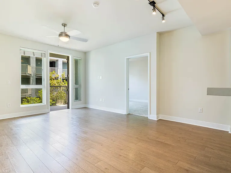 Living Room with Balcony and Hard Surface Flooring