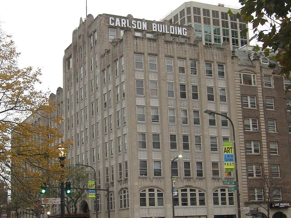The exterior of the building. The listing is to top floor be