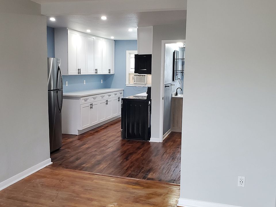 Living room opens to the kitchen and bath for a convenient , efficient layout